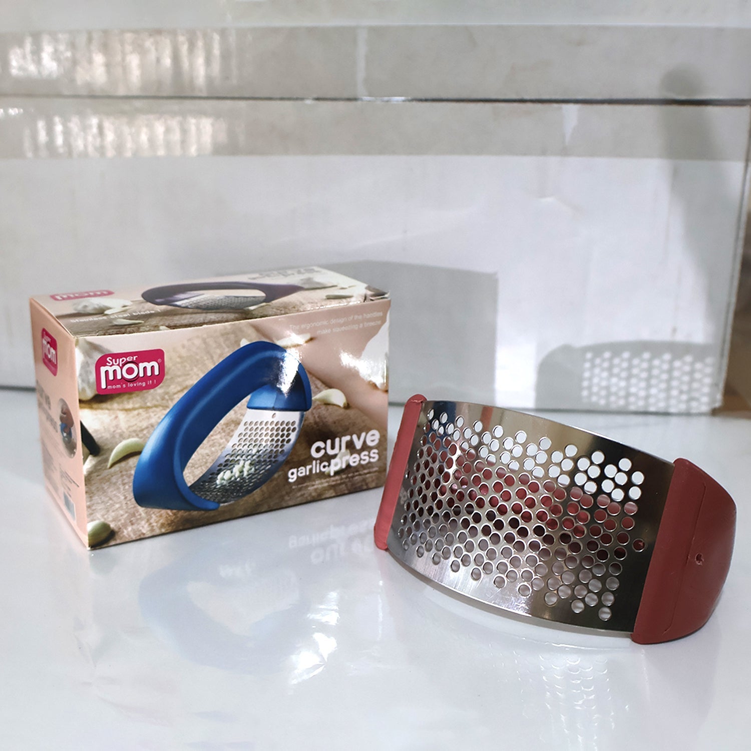 Supermom Premium Curve Garlic Press Crusher (1 Pc) Supermom Premium Curve Garlic Press Crusher (1 Pc)